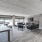 Large clubroom with wood floors and seating 