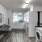 Large well lit community laundry room 
